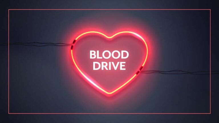Neon heart with Blood Drive text in the middle